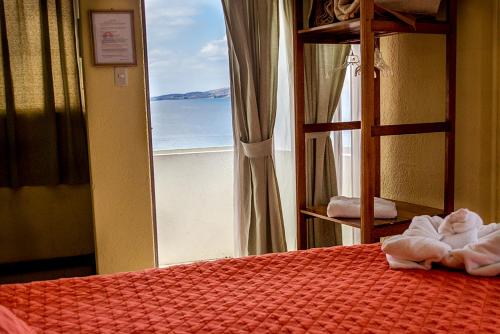 Ein Bett oder Betten in einem Zimmer der Unterkunft Hotel Sabana