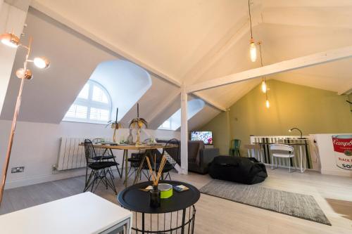 a room with a tent with a table and chairs at Nadler House Flat 1 & 2 in Norwich