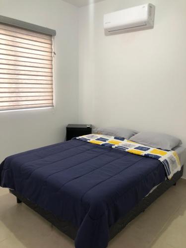 Ένα ή περισσότερα κρεβάτια σε δωμάτιο στο CASA EN PRIVADA FRENTE A LA PLAYA CON ALBERCA!