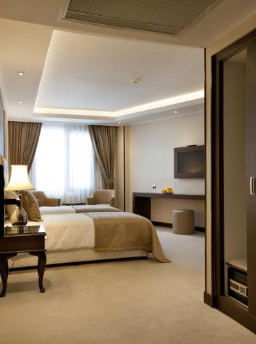 Katil atau katil-katil dalam bilik di Black Bird Thermal Hotel & SPA