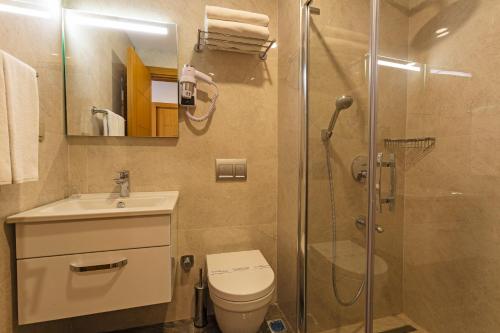 
Een badkamer bij Acra Hotel - Special Category
