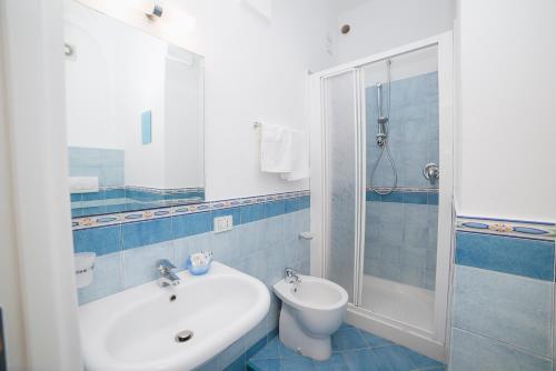 Ванная комната в Hotel De Rosa