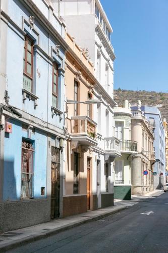 a row of buildings on a city street at Casa Doña Carmela GuestHouse - Tenerife in Santa Cruz de Tenerife