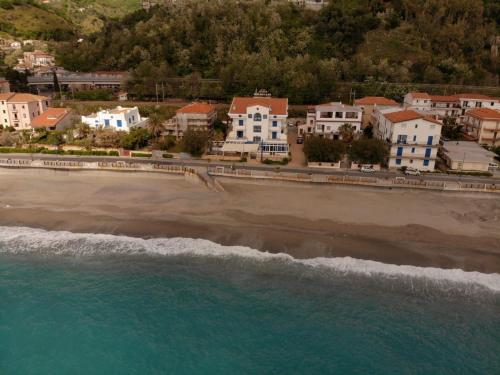 an aerial view of a beach with houses at Sea Garden Hotel in Acquappesa