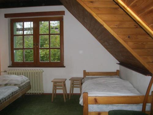 Säng eller sängar i ett rum på Chalupa Mlyn Dolný Kubín