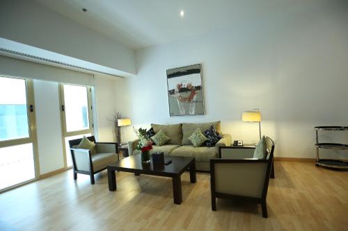 Гостиная зона в Asdal Gulf Inn Boutique Hotel- SEEF