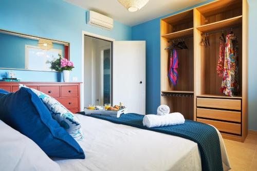 Postel nebo postele na pokoji v ubytování Una Finestra Sul Mediterraneo
