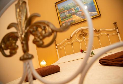 a close up of a bed in a bedroom at B&B Il Girasole in Balestrate