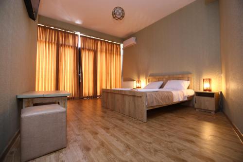 Postel nebo postele na pokoji v ubytování Hotel Traveler