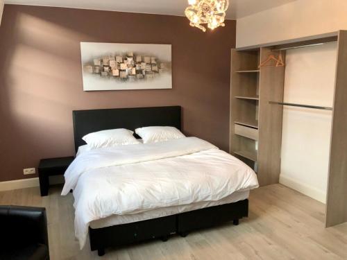 Una cama o camas en una habitación de Inga