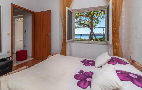 Postel nebo postele na pokoji v ubytování Apartments Villa Bella Vista Seget