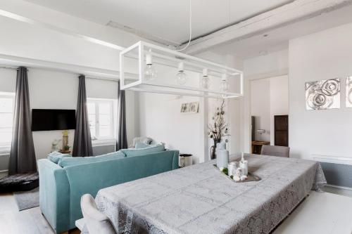 Postel nebo postele na pokoji v ubytování Reflets Sur La Lauch appartements