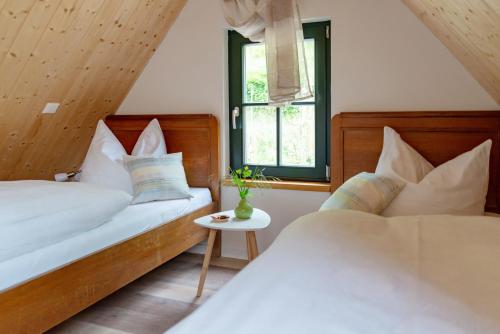 Un pat sau paturi într-o cameră la Balancehaus Kohren-Sahlis, dein Kurhaus in Sachsen