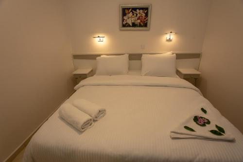 Katil atau katil-katil dalam bilik di Mitos Apartments