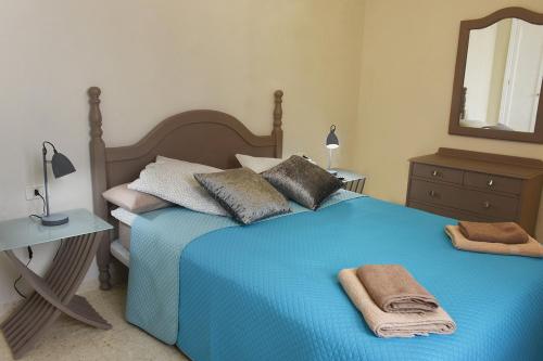 Кровать или кровати в номере Casa Serena