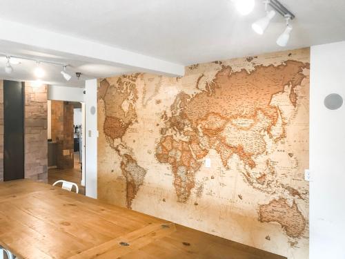 a room with a map of the world on the wall at Red Sands Hotel in Torrey