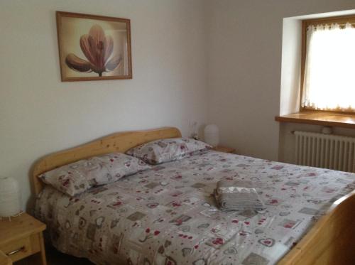 Una cama o camas en una habitación de Casa Lausen