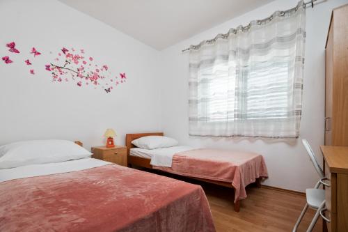 Cama o camas de una habitación en Apartment Mihaela