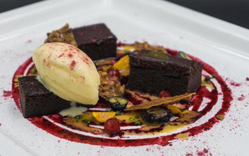 a plate of chocolate desserts on a white plate at Hotel Skaftafell in Skaftafell