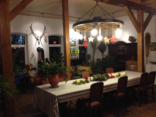 a dining room table with fruits and vegetables on it at Wrede-Hof in Kappeler Niederstrich