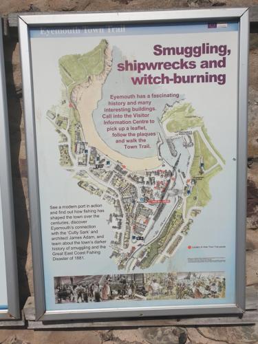 a sign with a map of the shwaukeeimeters and which building at The Herring Queen in Eyemouth