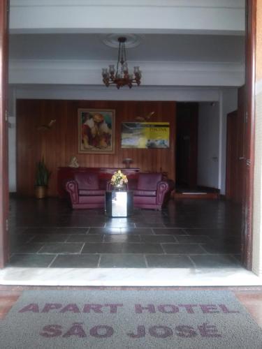 Coin salon dans l'établissement Apart Hotel em Caxambu207