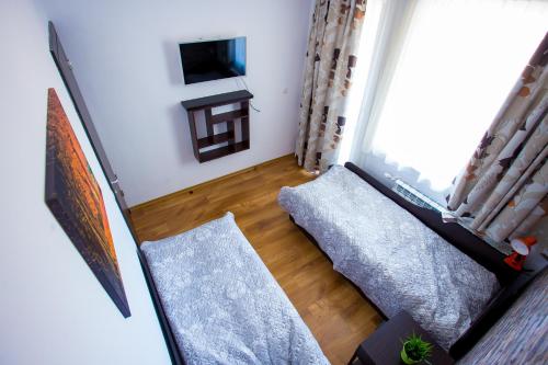 TV a/nebo společenská místnost v ubytování Apartment IVA - Iglika 2