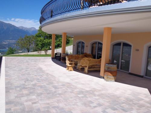 a pavilion with a view of a house at Affittacamere Dolce Sogno in Coredo