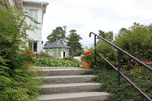 a set of stairs in front of a house at Åh Stifts- & Konferensgård in Ljungskile