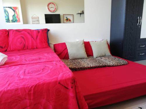 Ένα ή περισσότερα κρεβάτια σε δωμάτιο στο JDT's Condo at Horizons 101 Cebu