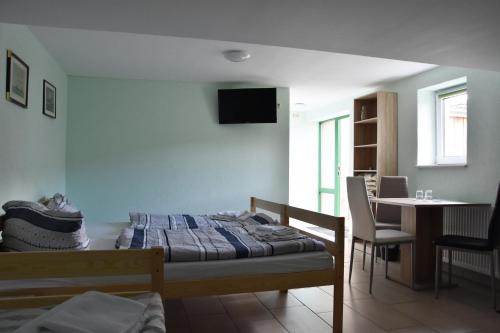 Ένα ή περισσότερα κρεβάτια σε δωμάτιο στο Kutscherhof Broock
