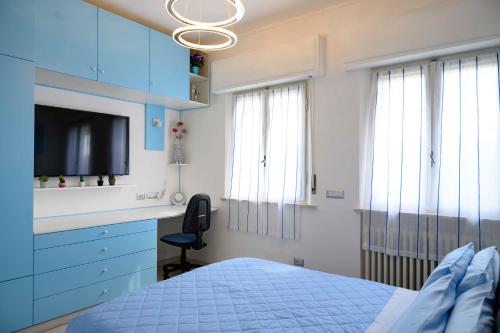 מיטה או מיטות בחדר ב-intero appartamento con giardino e colazione Dario