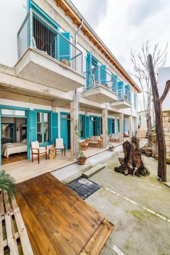 a large house with blue walls and a patio at NICOSIA EAGLE EYE in North Nicosia
