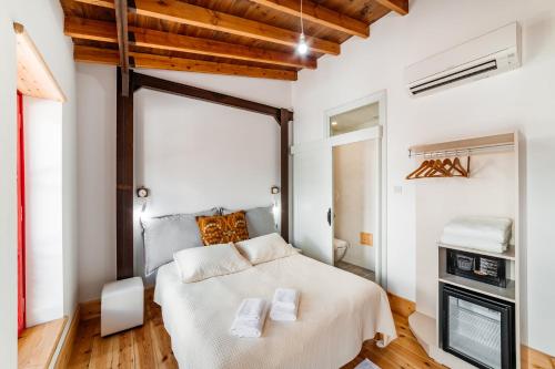 a bedroom with a bed and a fireplace at NICOSIA EAGLE EYE in North Nicosia