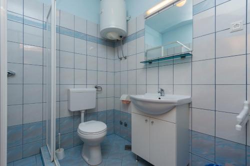 Kúpeľňa v ubytovaní Milos Apartment
