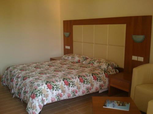 Ένα ή περισσότερα κρεβάτια σε δωμάτιο στο Hotel Laura Christina