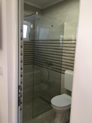Ένα μπάνιο στο Apartments Gusar