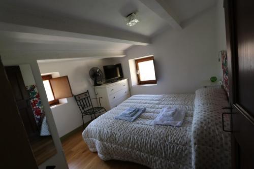 Cama ou camas em um quarto em B&B Bosimano