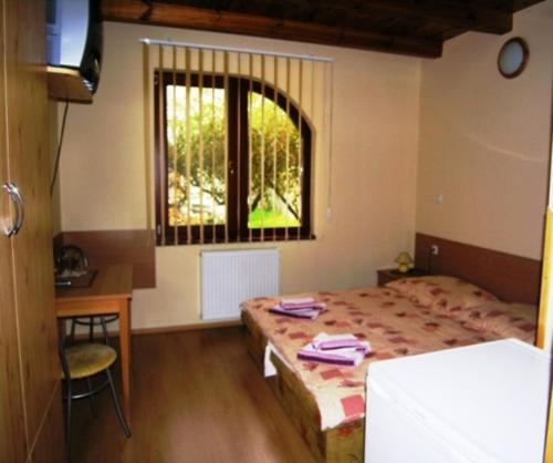 Katil atau katil-katil dalam bilik di Vila Anna