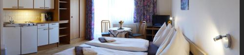 Posteľ alebo postele v izbe v ubytovaní Appartements Sonnberg