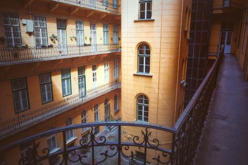 an empty balcony of a building with windows at József krt 3BR - near Corvin in Budapest