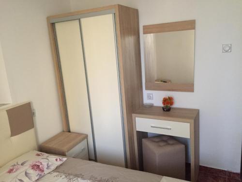 Ένα ή περισσότερα κρεβάτια σε δωμάτιο στο Apartments Gusar