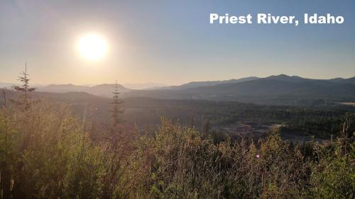 a view of the sun rising over the mountains at Eagle's Nest Motel in Priest River