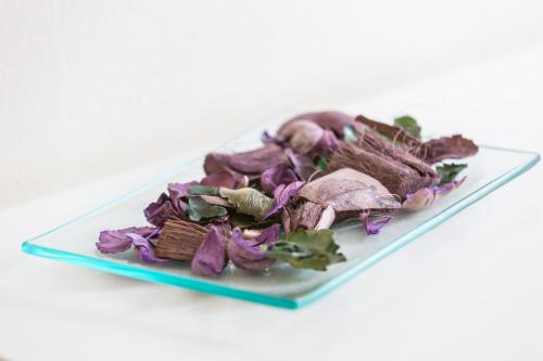 a plate of dried vegetables on a white background at Oasi Hotel in Levanto