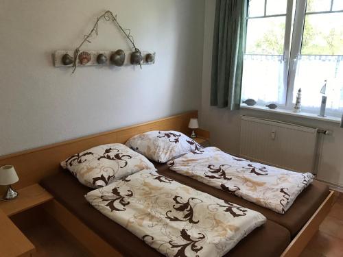 Tempat tidur dalam kamar di Auszeit