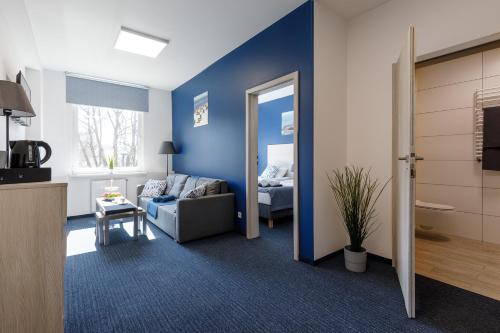 TV a/nebo společenská místnost v ubytování AQUA HOUSE