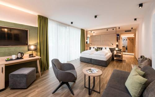Ένα ή περισσότερα κρεβάτια σε δωμάτιο στο Hotel Clara