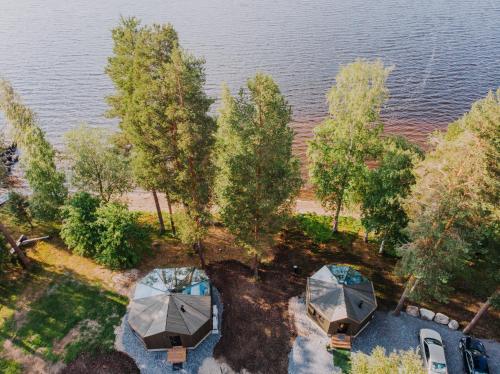 an overhead view of a tree with two tents at Revontuli Resort Glass Igloos in Hankasalmi