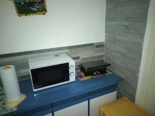 A television and/or entertainment centre at Acque Lucenti