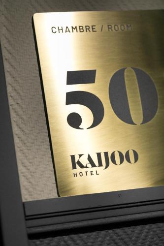 Certificado, premio, señal o documento que está expuesto en Hotel Kaijoo by HappyCulture